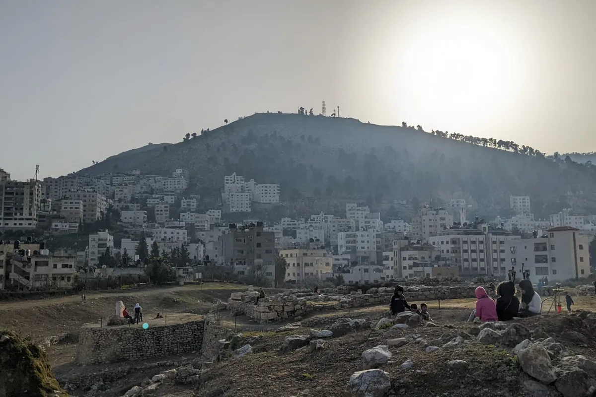 Tel Balata at the foot of Mount Ebal, surrounded by the houses of Nablus